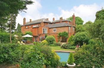 A former Coach House with wonderful charm and historic interest
